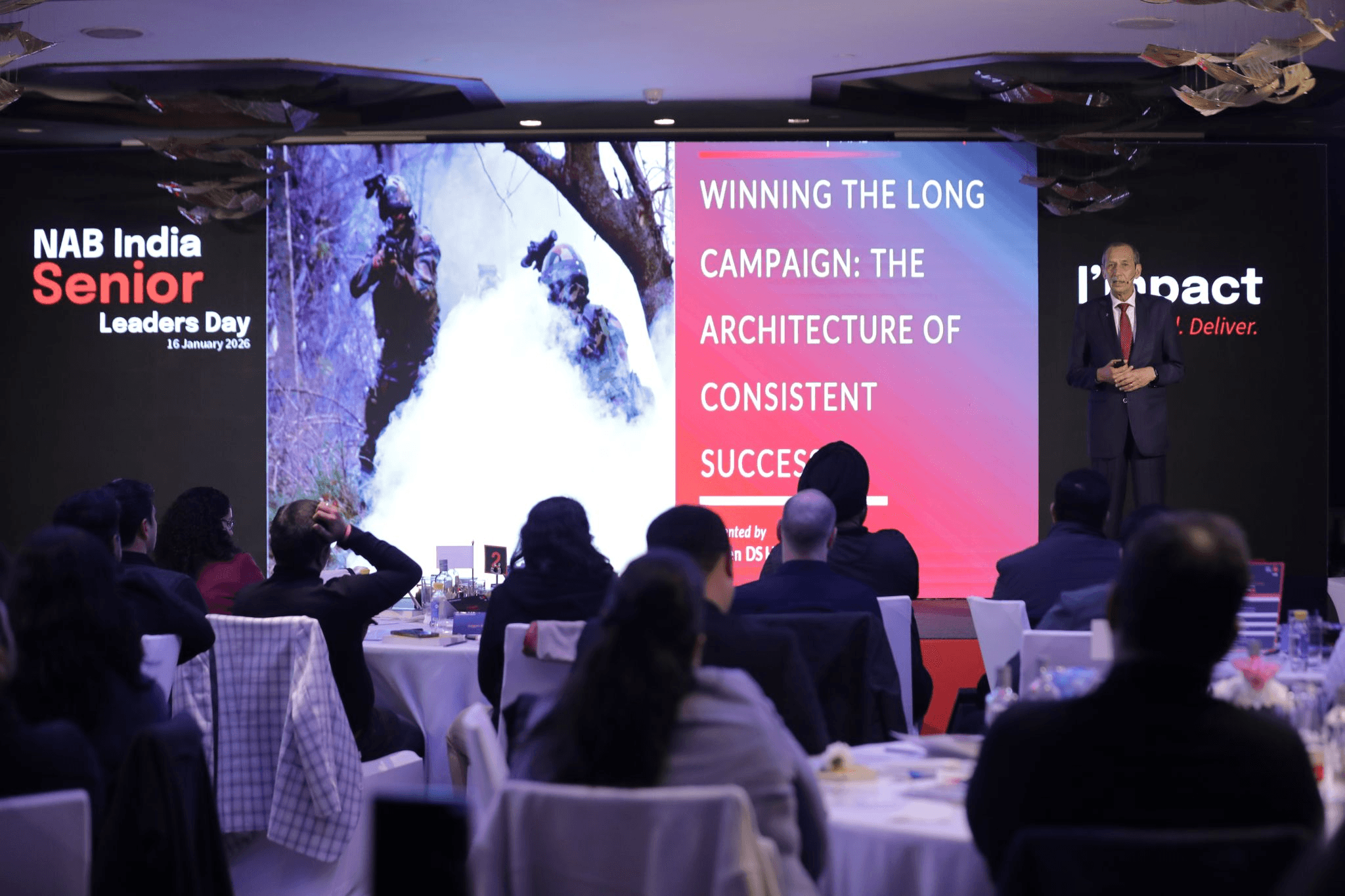 black quadcopter drone flying over snow field during daytime