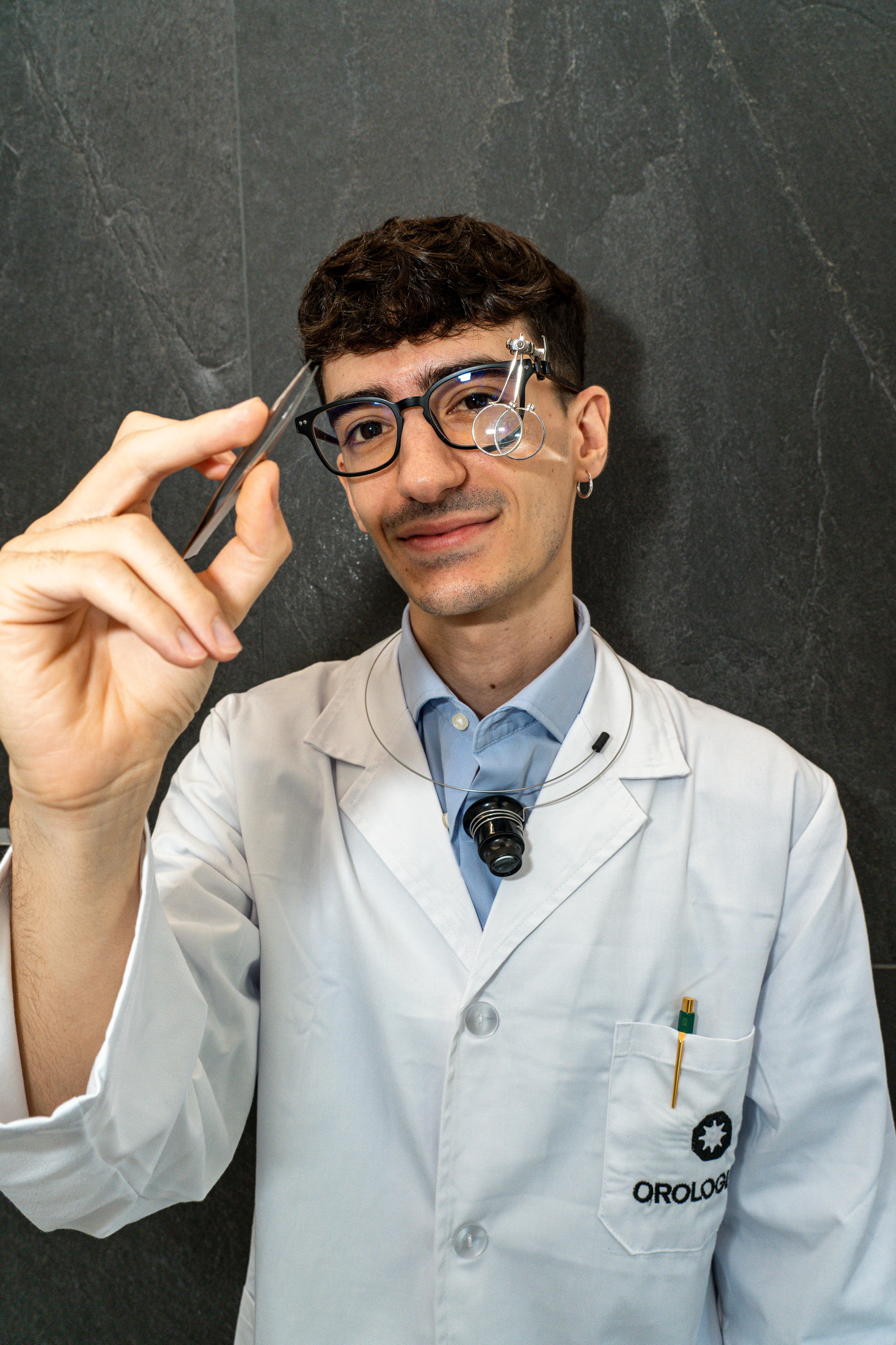 a black watch on a white surface