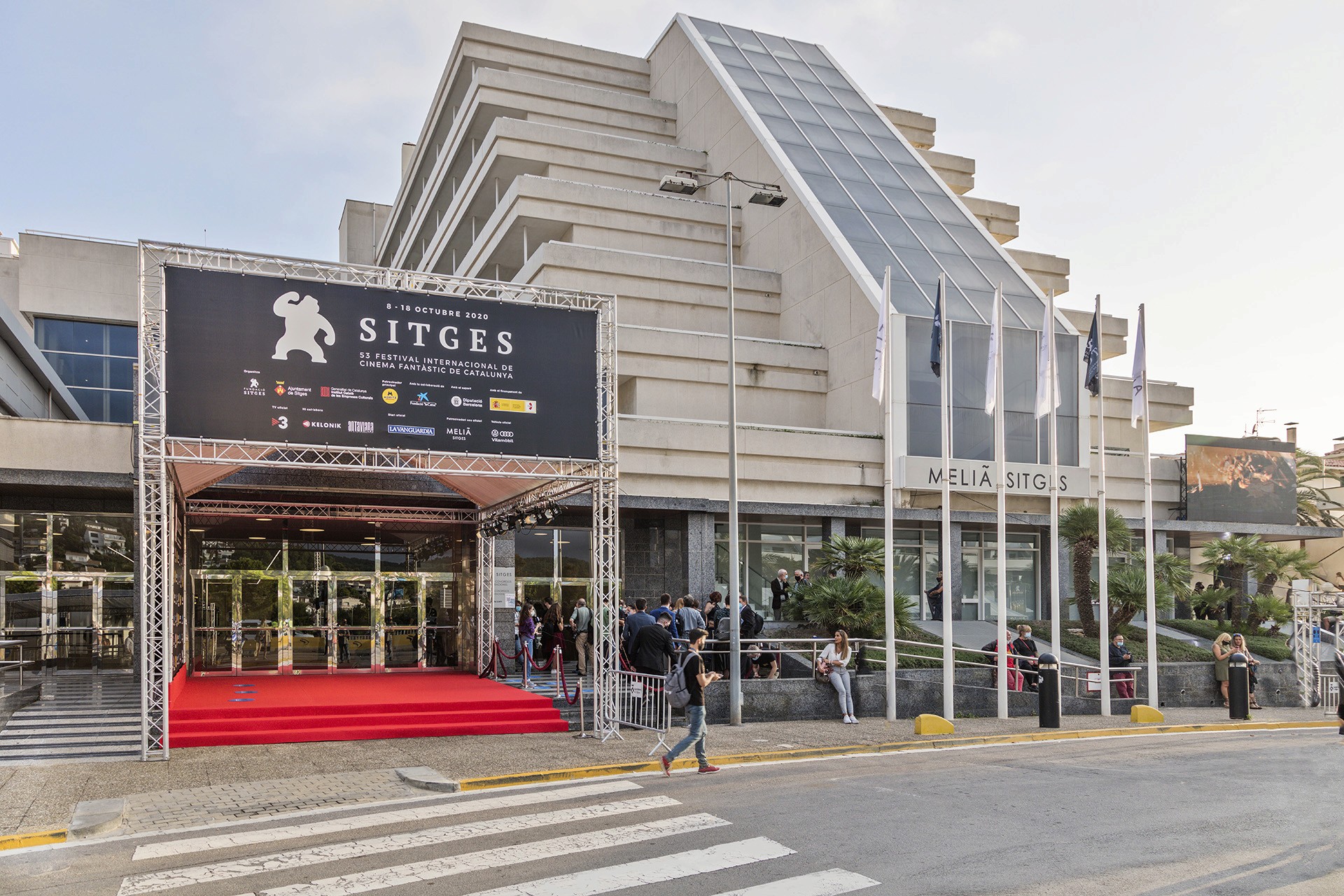 Ethan Harper is posing with umbrella