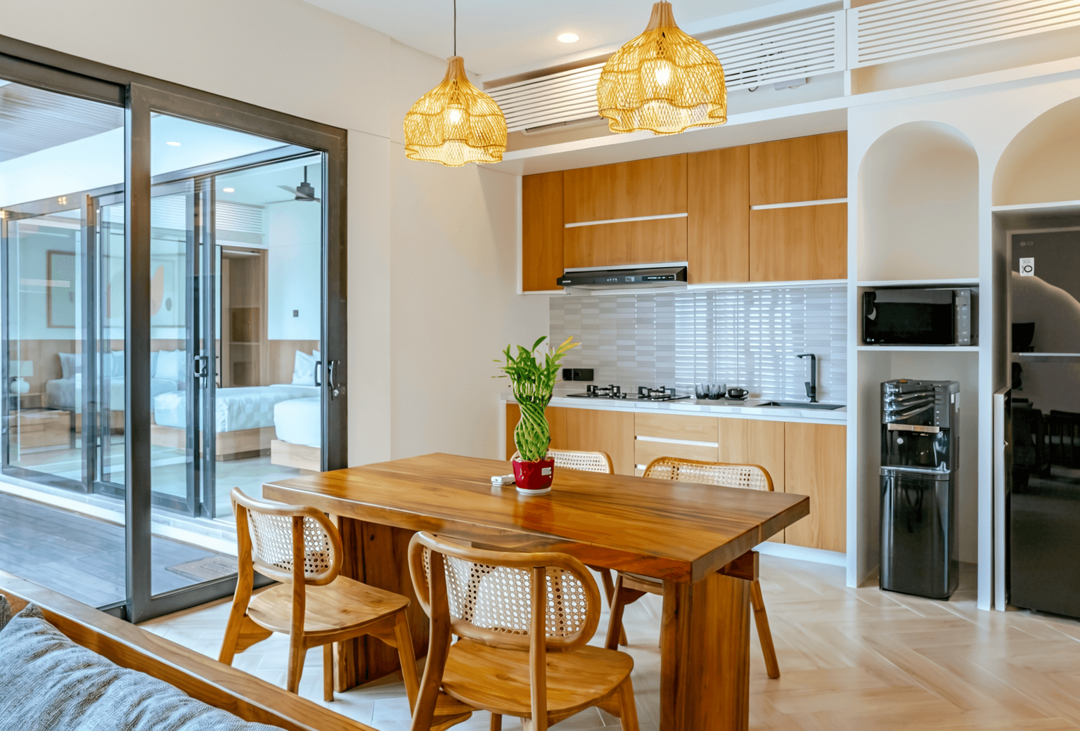 Open-plan dining and kitchen in Jimbaran. Expert real estate services for luxury home buyers in Bali.