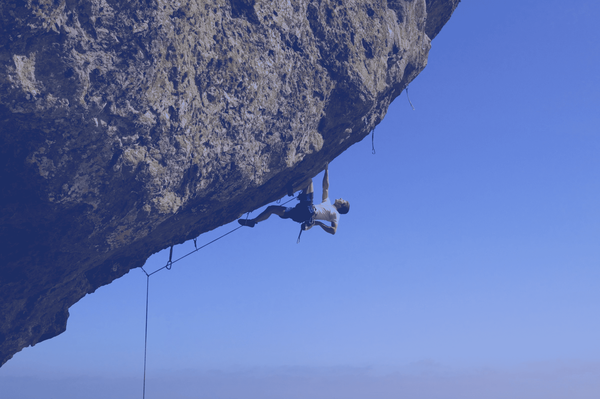 Climber using ropes to ascend