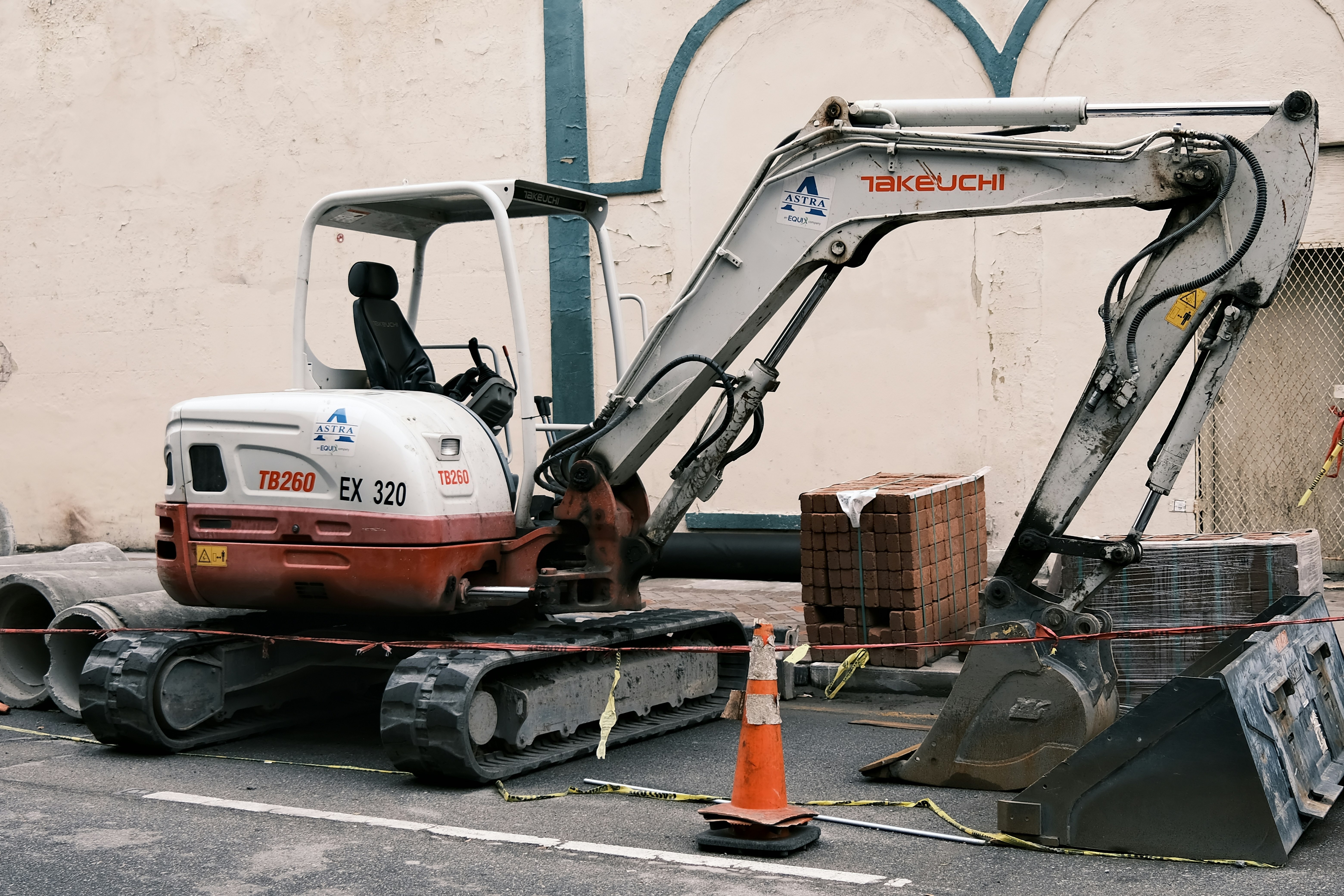 a white truck with a large machine