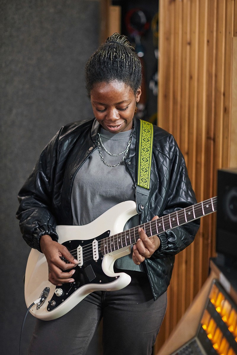 Girl playing guitar