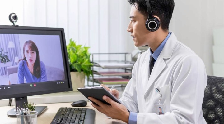 healthcare practitioner starting telemedicine consultation with patient