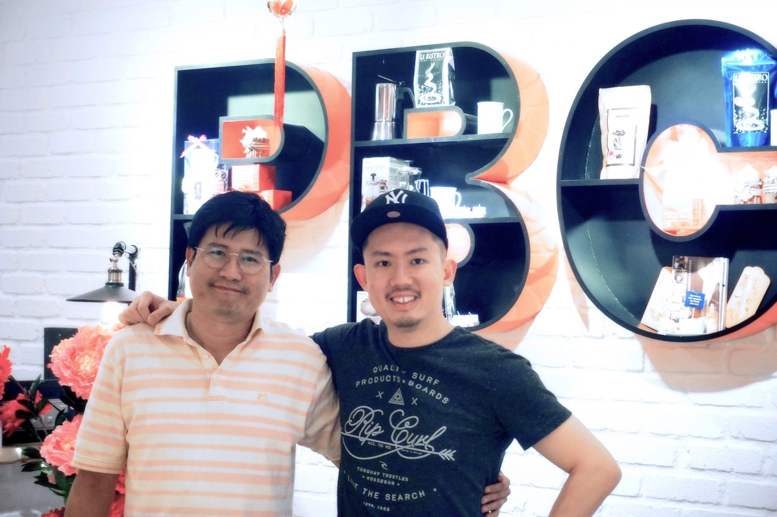 owner of Penang Best Coffee posing with a StoreHub representative