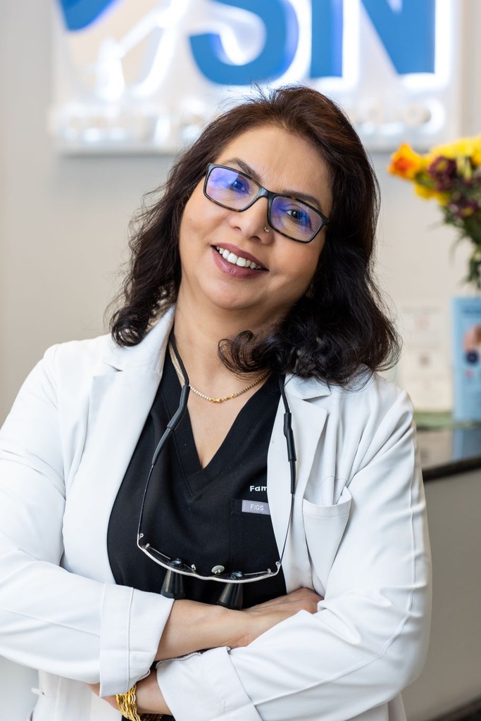 Dr. Navneet Rai Smiling in Newark Reception NJ