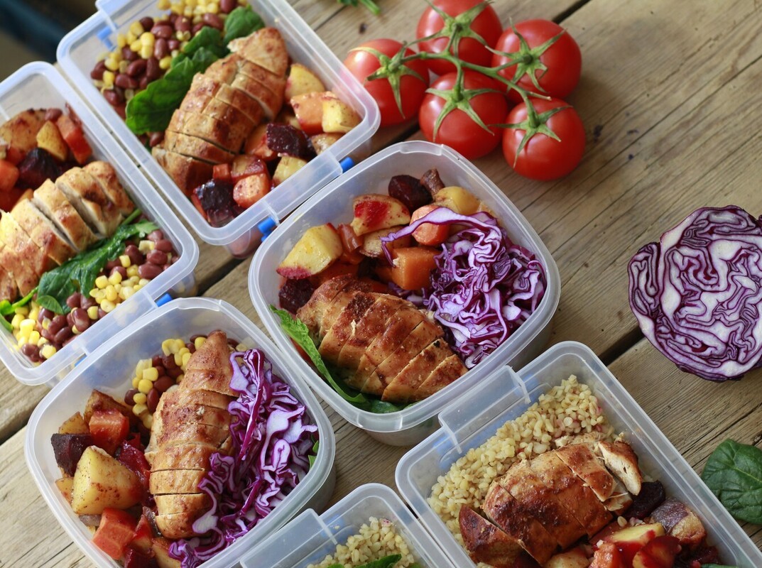 meal prep containers with healthy lunches as part of how to lose weight without exercise