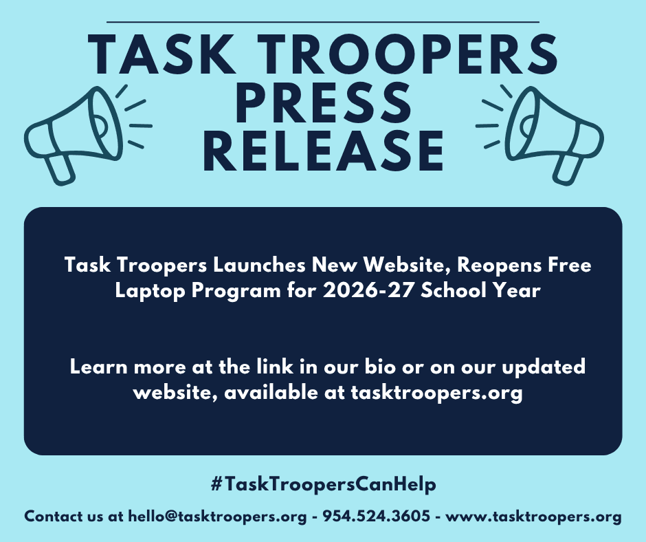 a black and white living room with a large tv