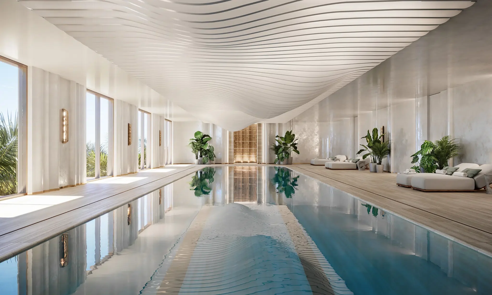 Indoor lap pool with floor-to-ceiling windows, lounge beds, and a sculptural wave ceiling