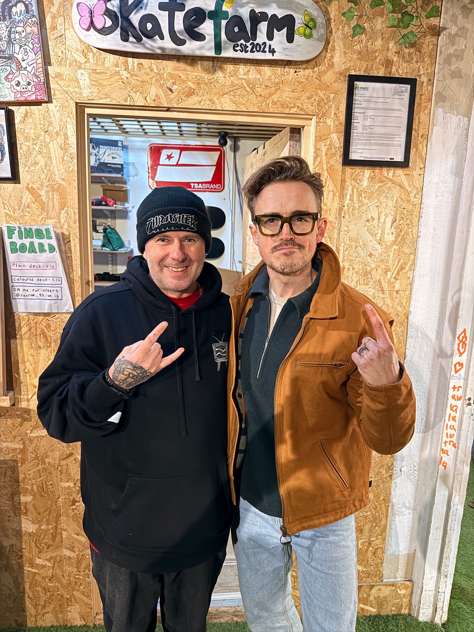 An adult rider building confidence on the mini ramp at The Skate Farm indoor skatepark in Sussex