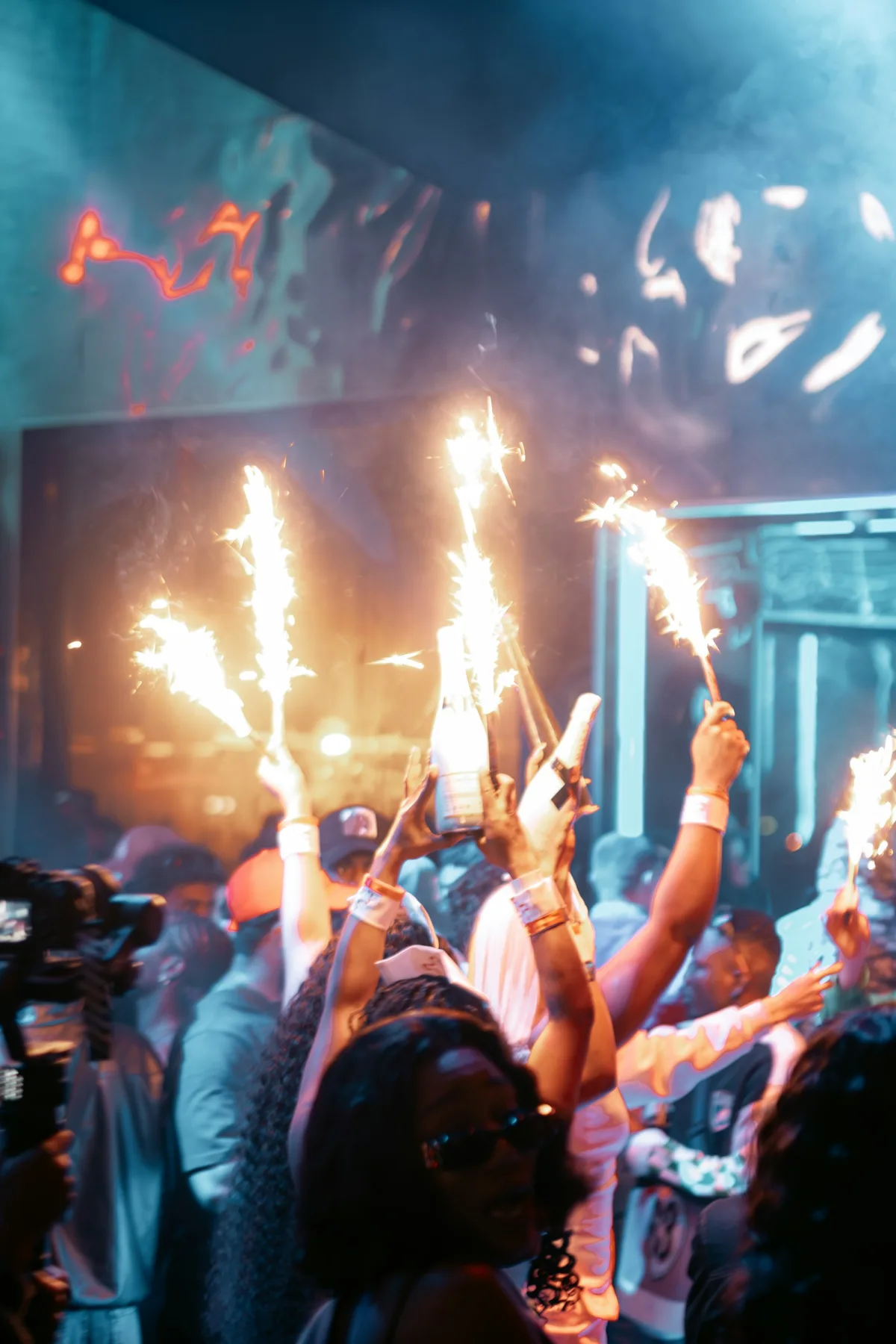 Bottles with sparklers arriving at a VIP table in a Dubai nightclub