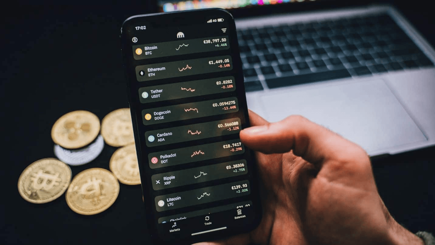 Person checking cryptocurrency prices - How to Swing Trade Crypto