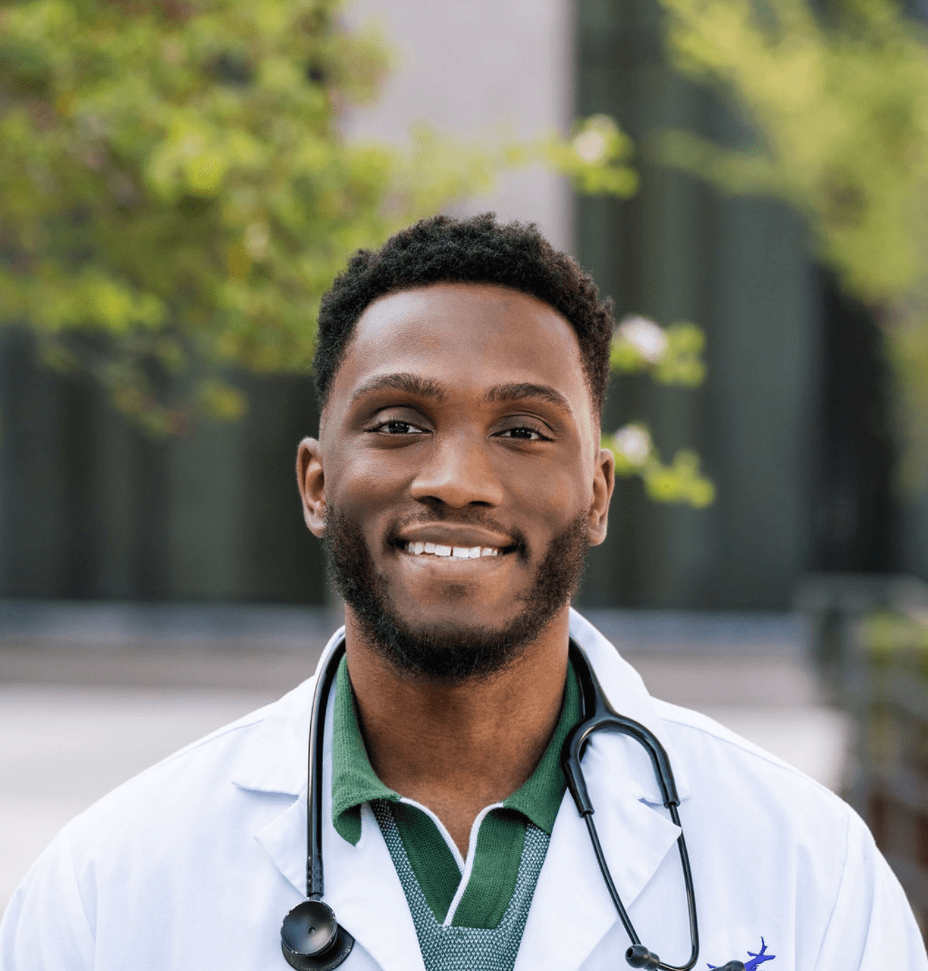 friendly female pediatrician touches shoulder teenage
