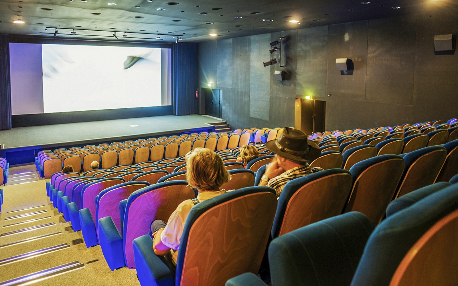 Cinema seating at Pont du Gard museum, showcasing a film experience.