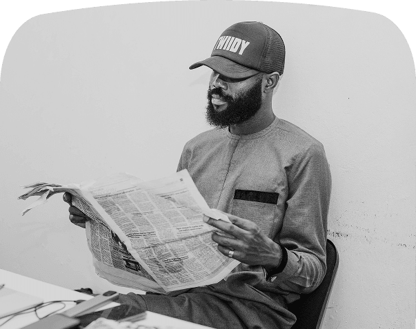 an image of friends of african descent reading infromation from a billboard post digital photo