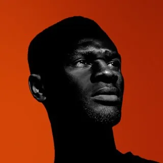 Man with an orange background