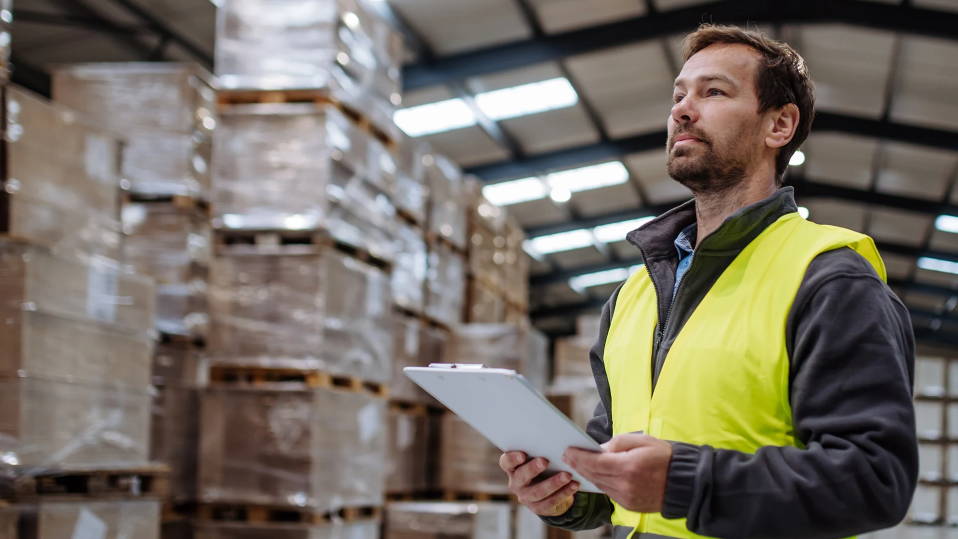 A factory floor manager Jack's Digital insights on his smart tablet