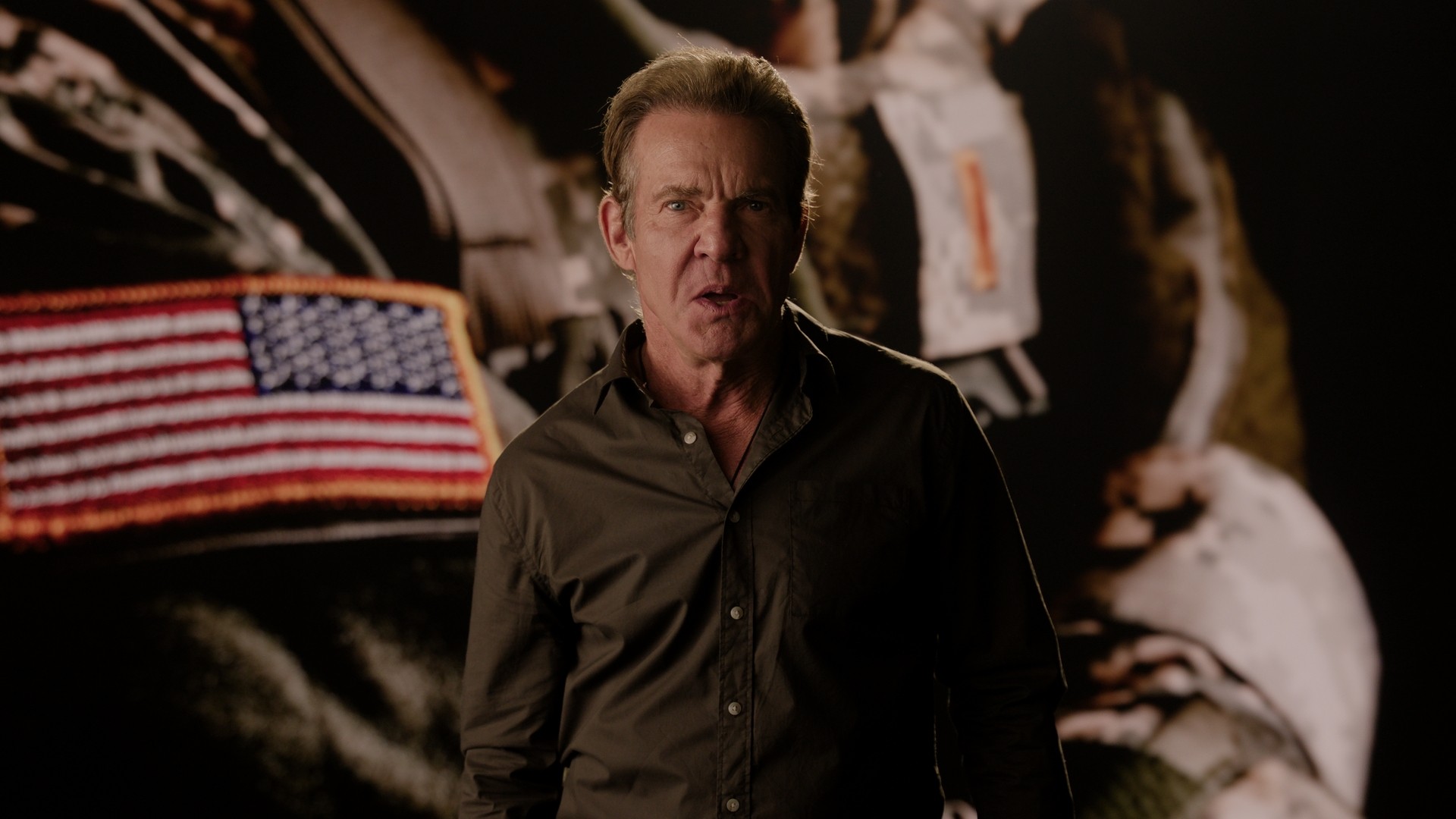 Family wearing traditional attire with lanterns, father holding a daughter up.