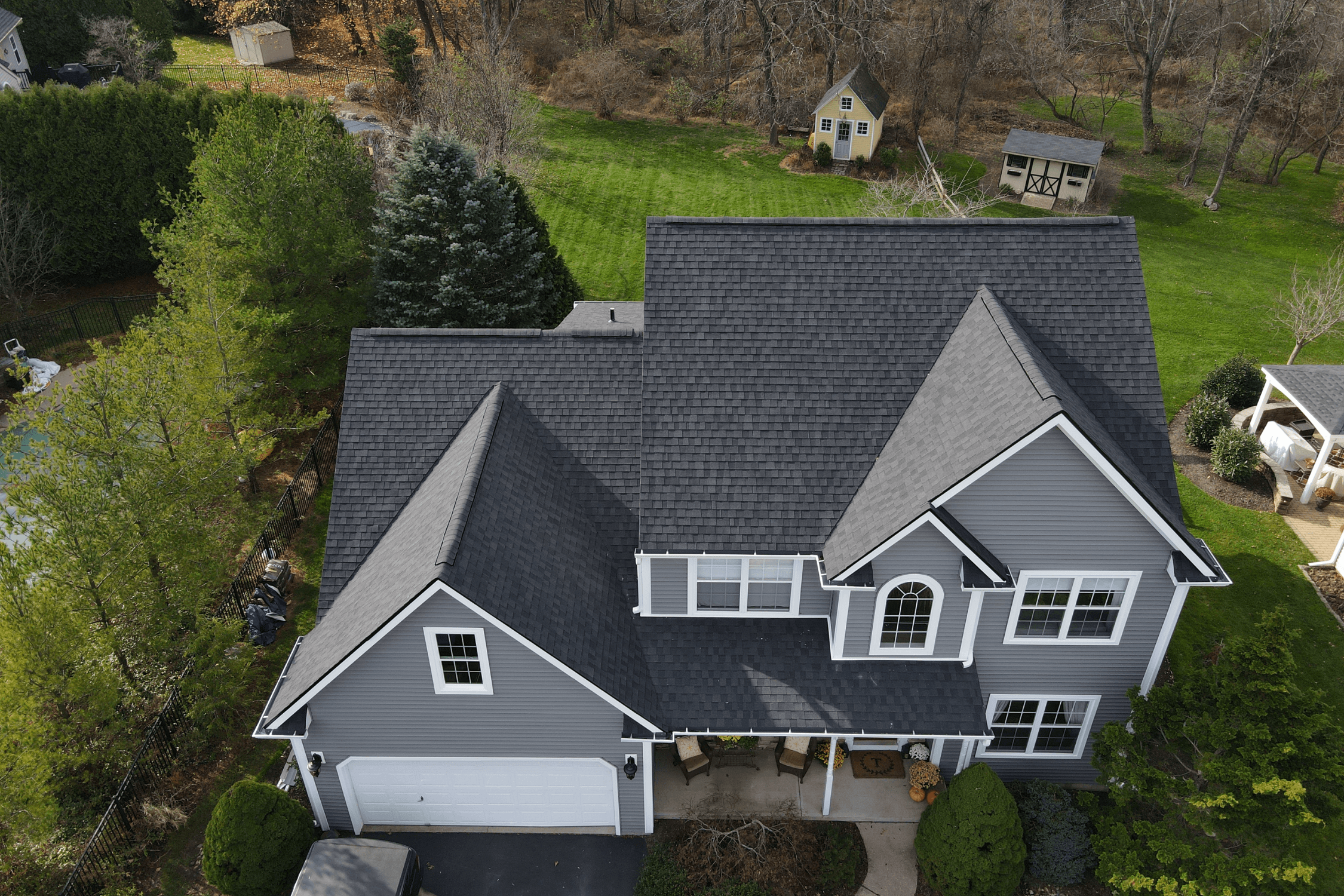Project with new Certainteed siding, roof, and gutters on home