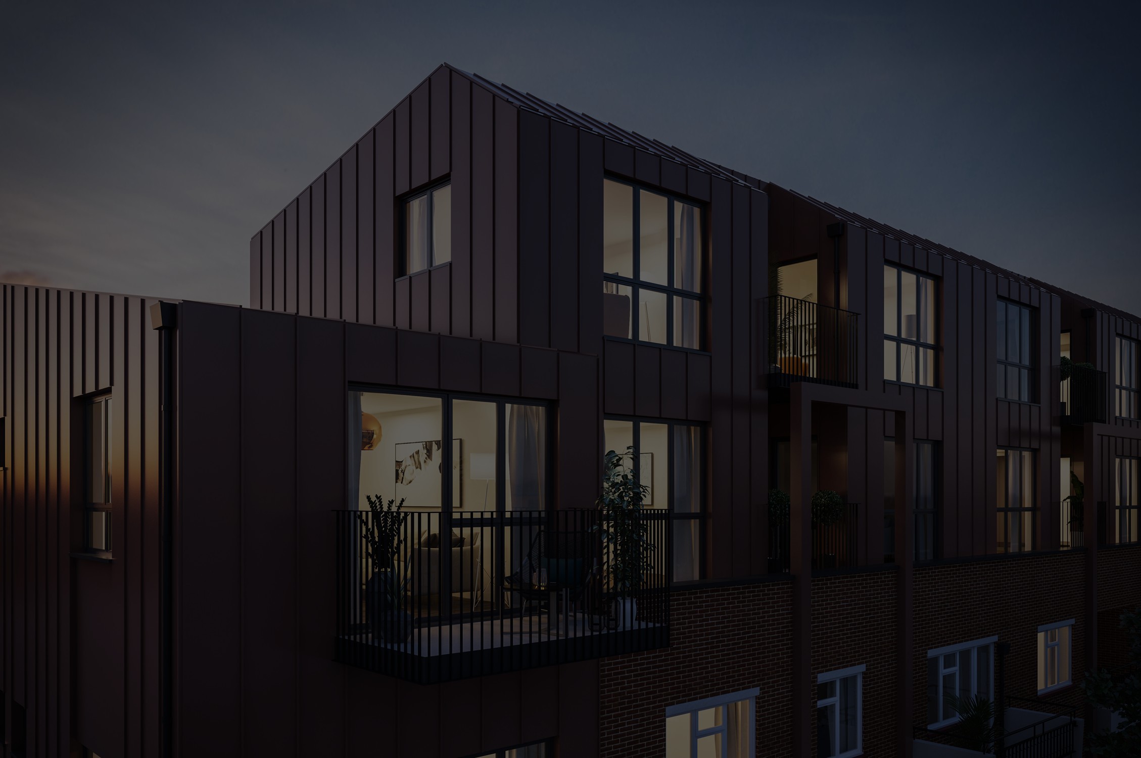 Modern glass house perched on a cliff edge, illuminated warmly against a serene, blue dusk backdrop. Overlooks a calm ocean, conveying tranquility.