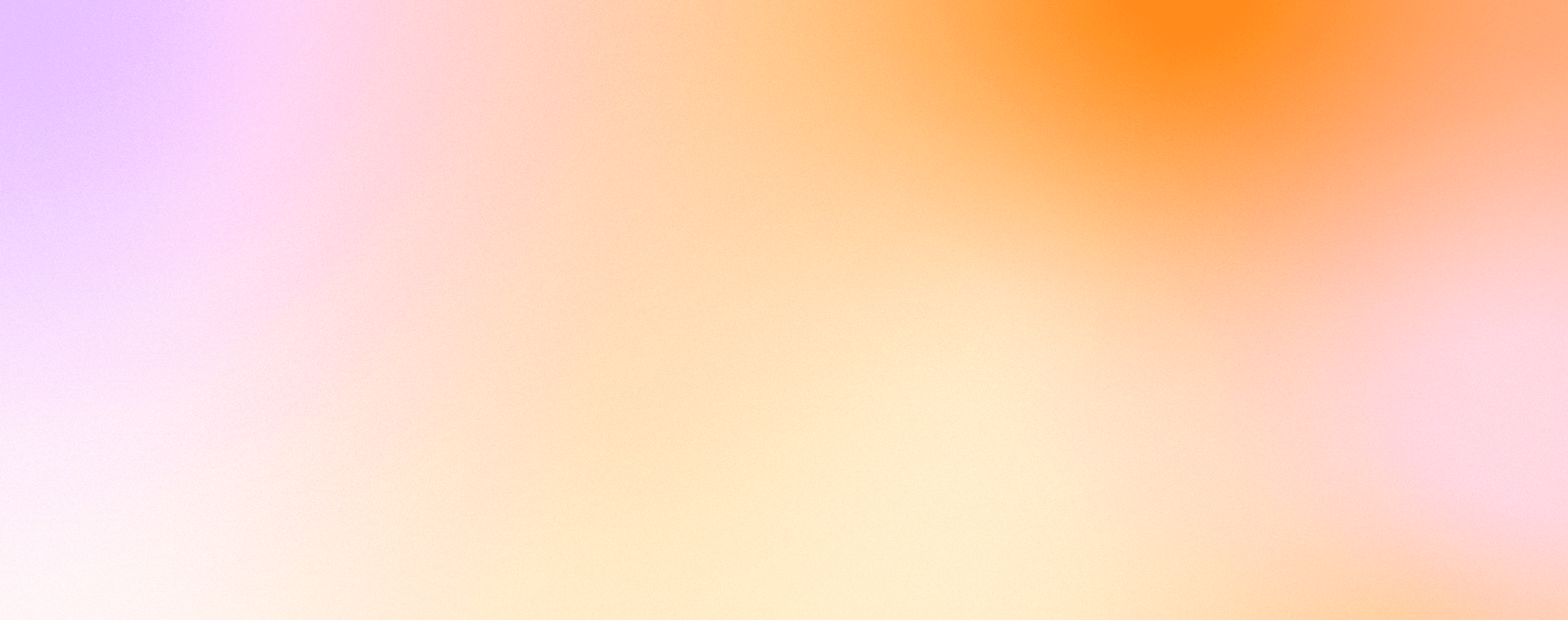 A gradient of oranges, pinks, purples, and yellows blending together to create a dreamy atmosphere.