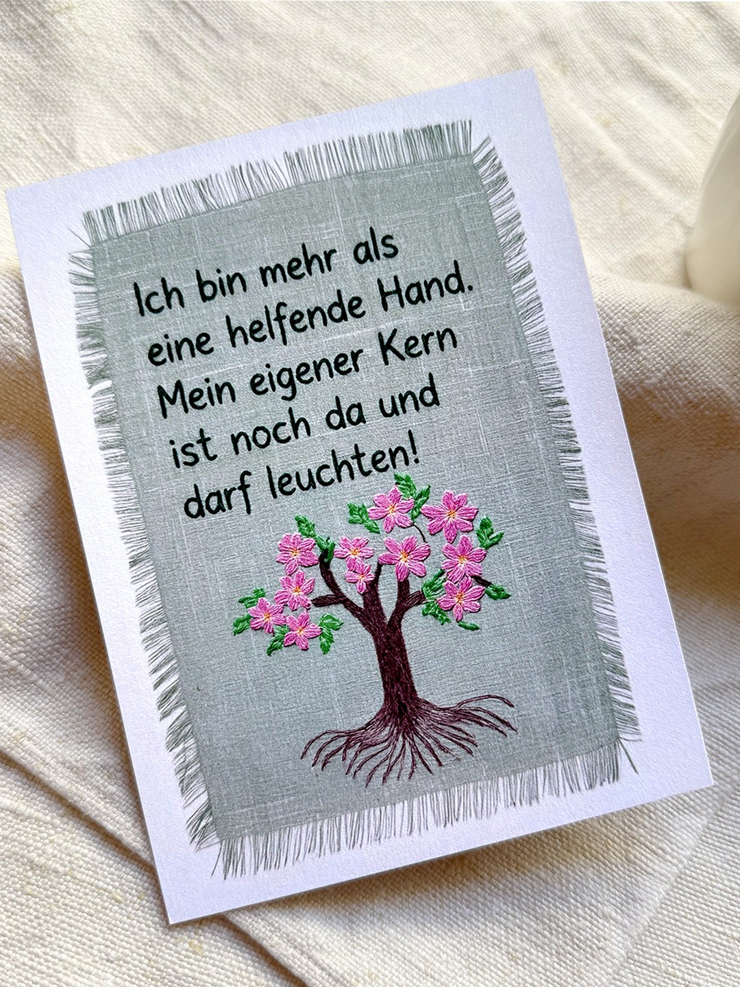 A Card with a embroidered Text