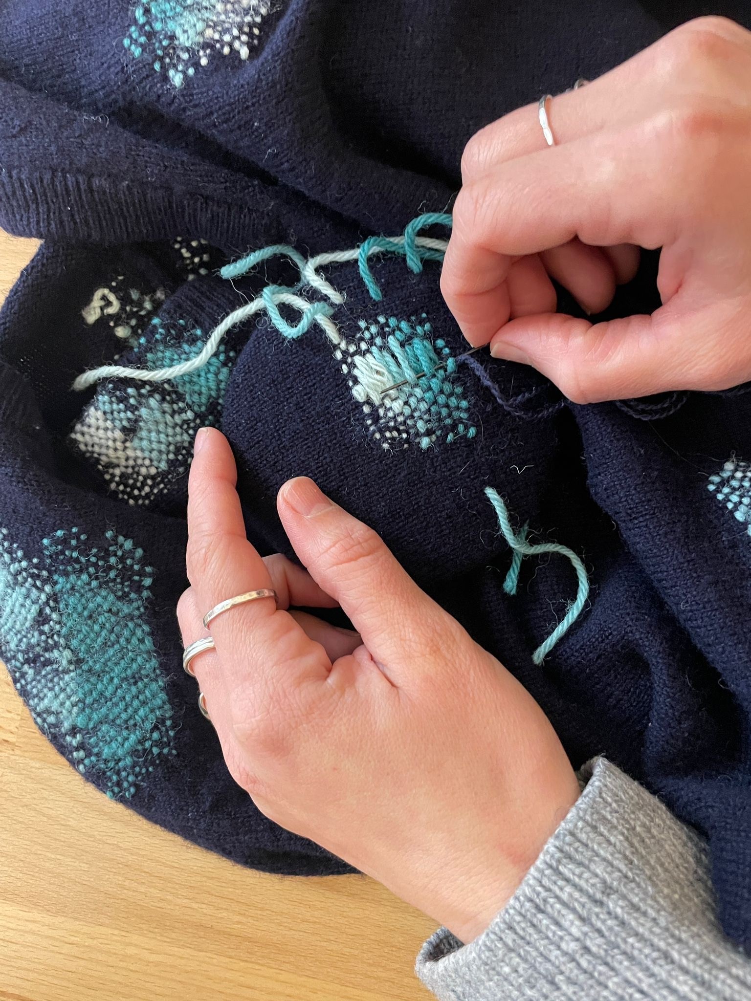 work in progress mending a jumper