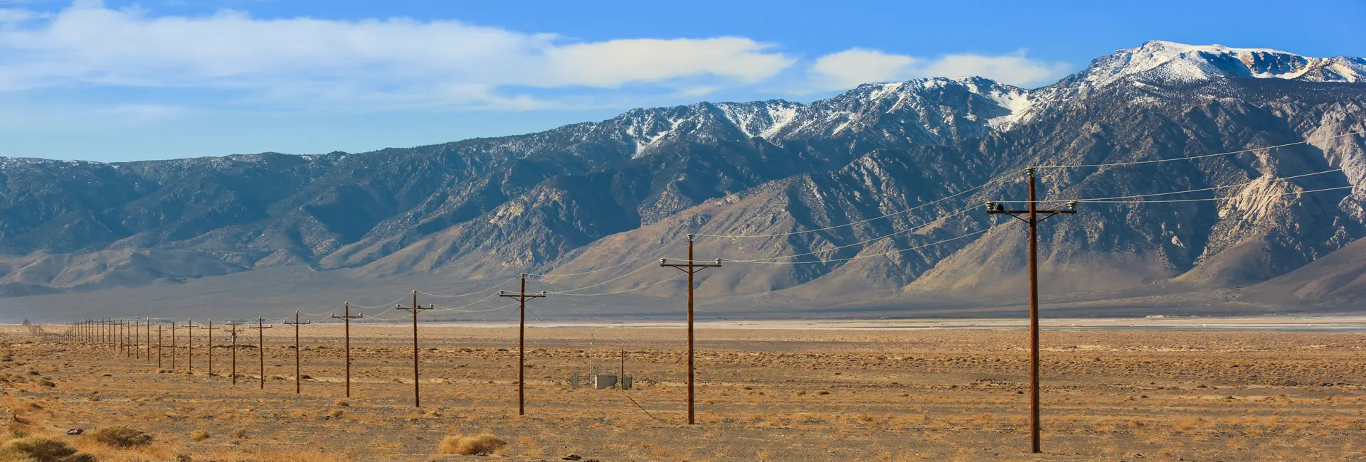 Electrical transmission lines crossing a mountainous utility corridor