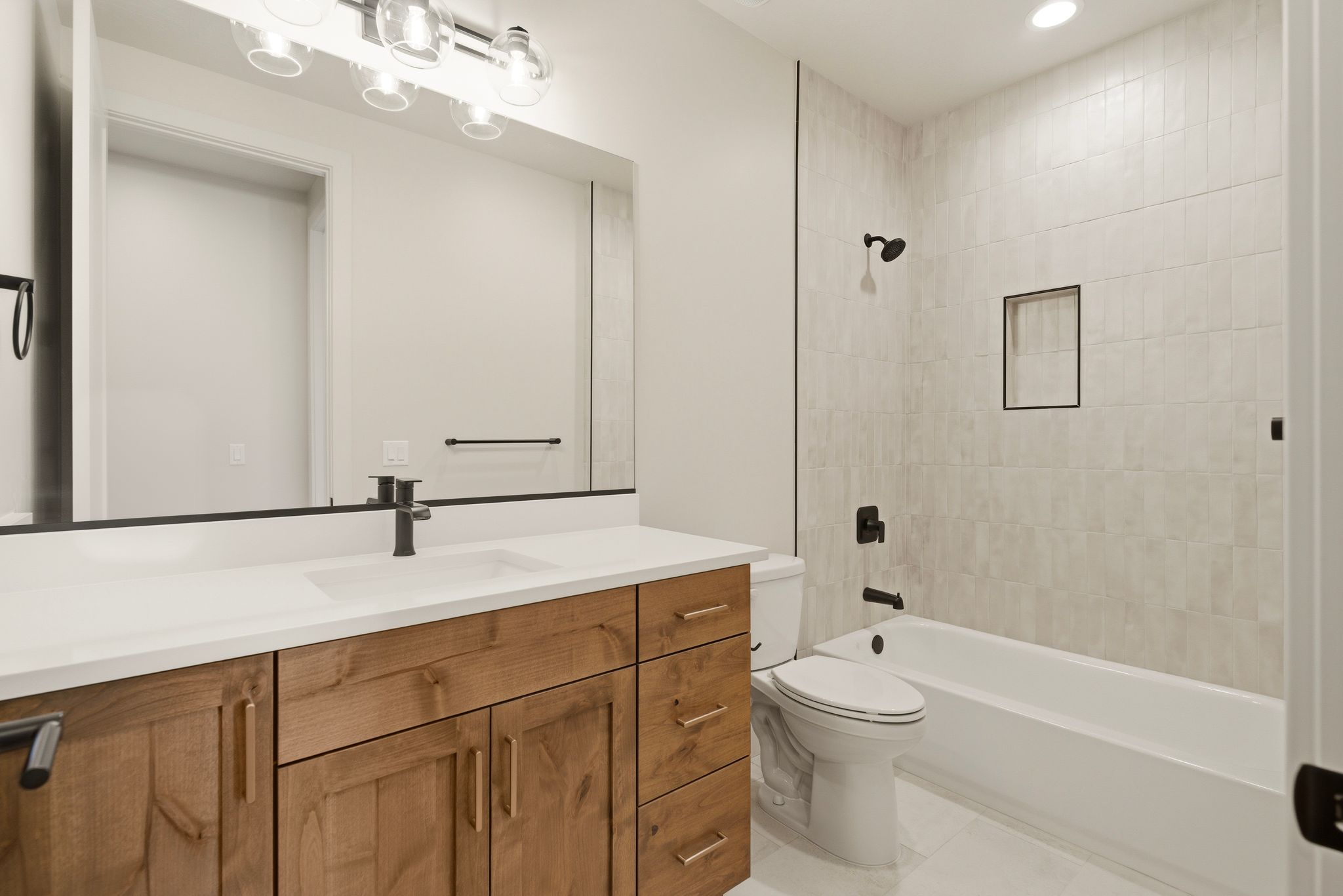 Bathroom at The View at Falcon Ridge in Hurricane, Utah, featuring modern fixtures and clean, bright finishes.