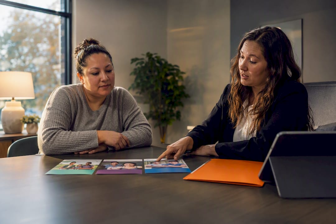 Caregiver reviewing waiver services with case manager