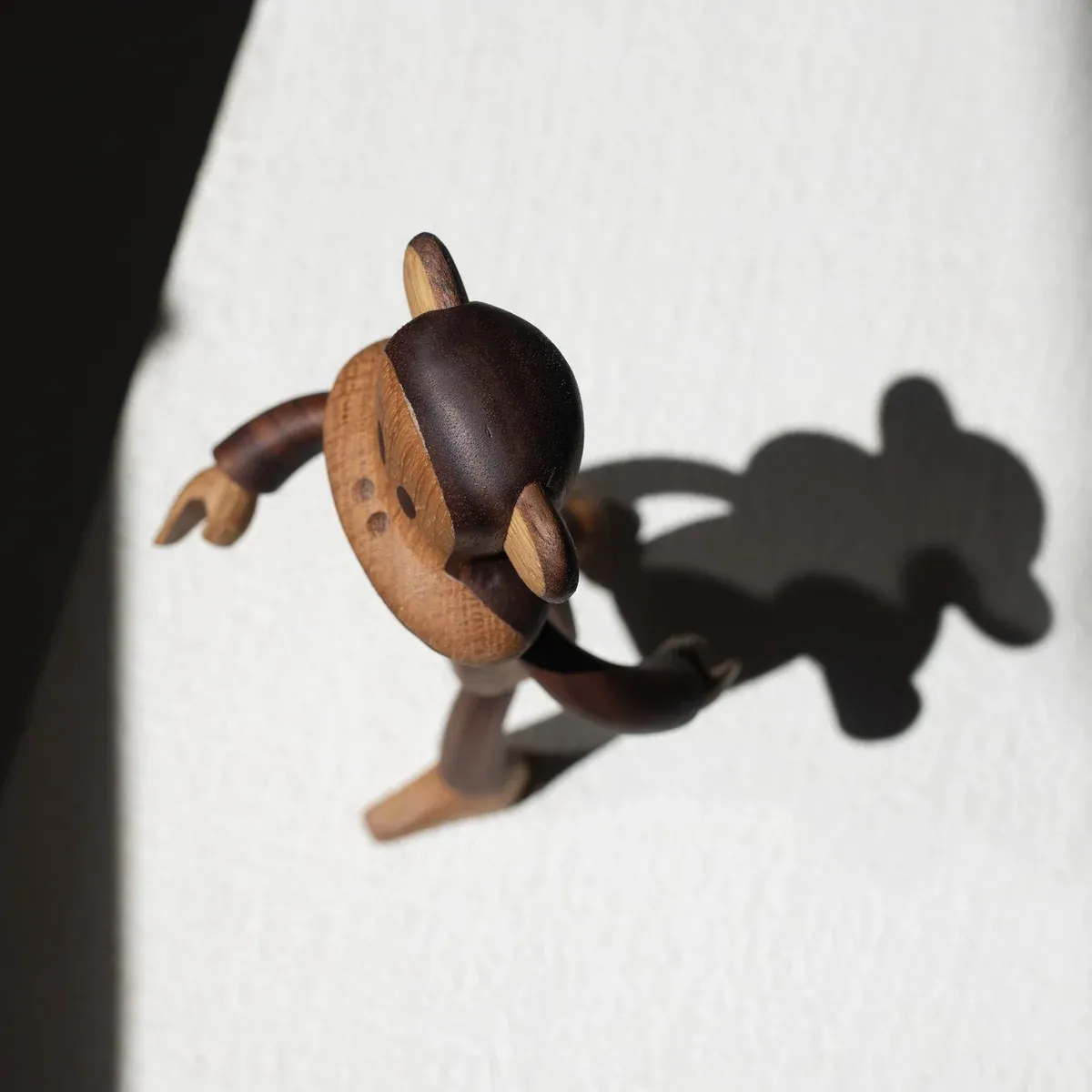 Licensed wooden figurine product development balancing character accuracy, material constraints and manufacturable wooden construction