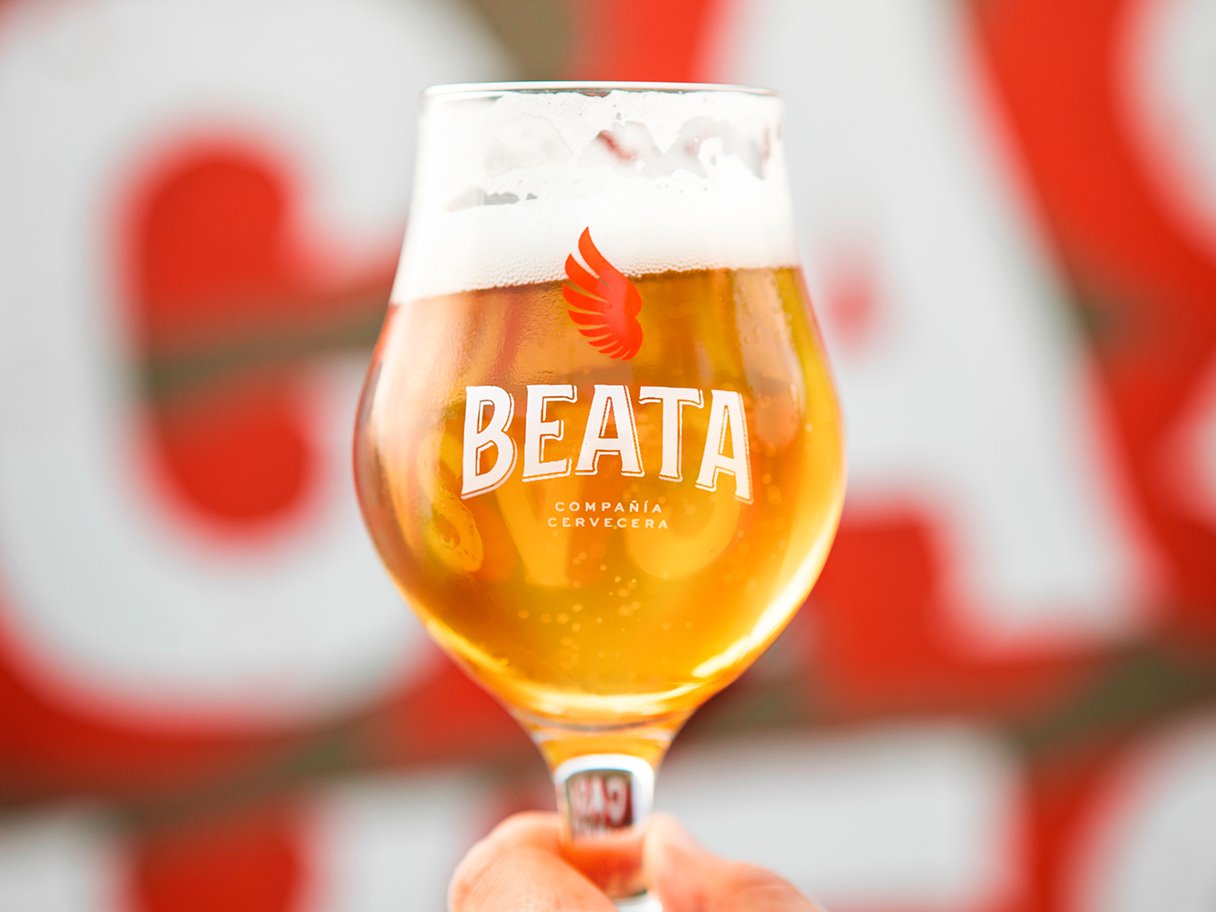 Rustic cabin in a golden field at sunset
