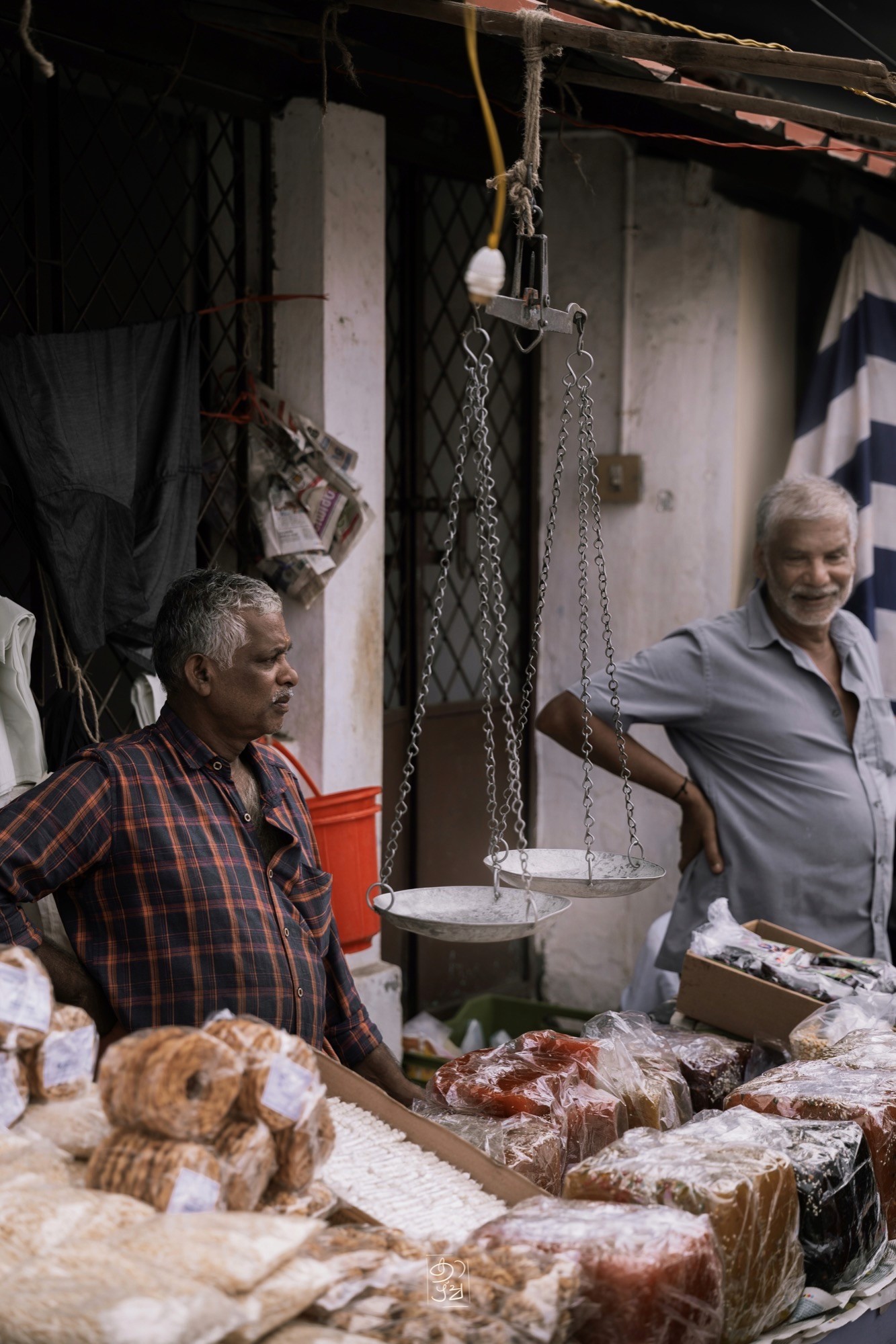 A roadside shop with its hanging scales