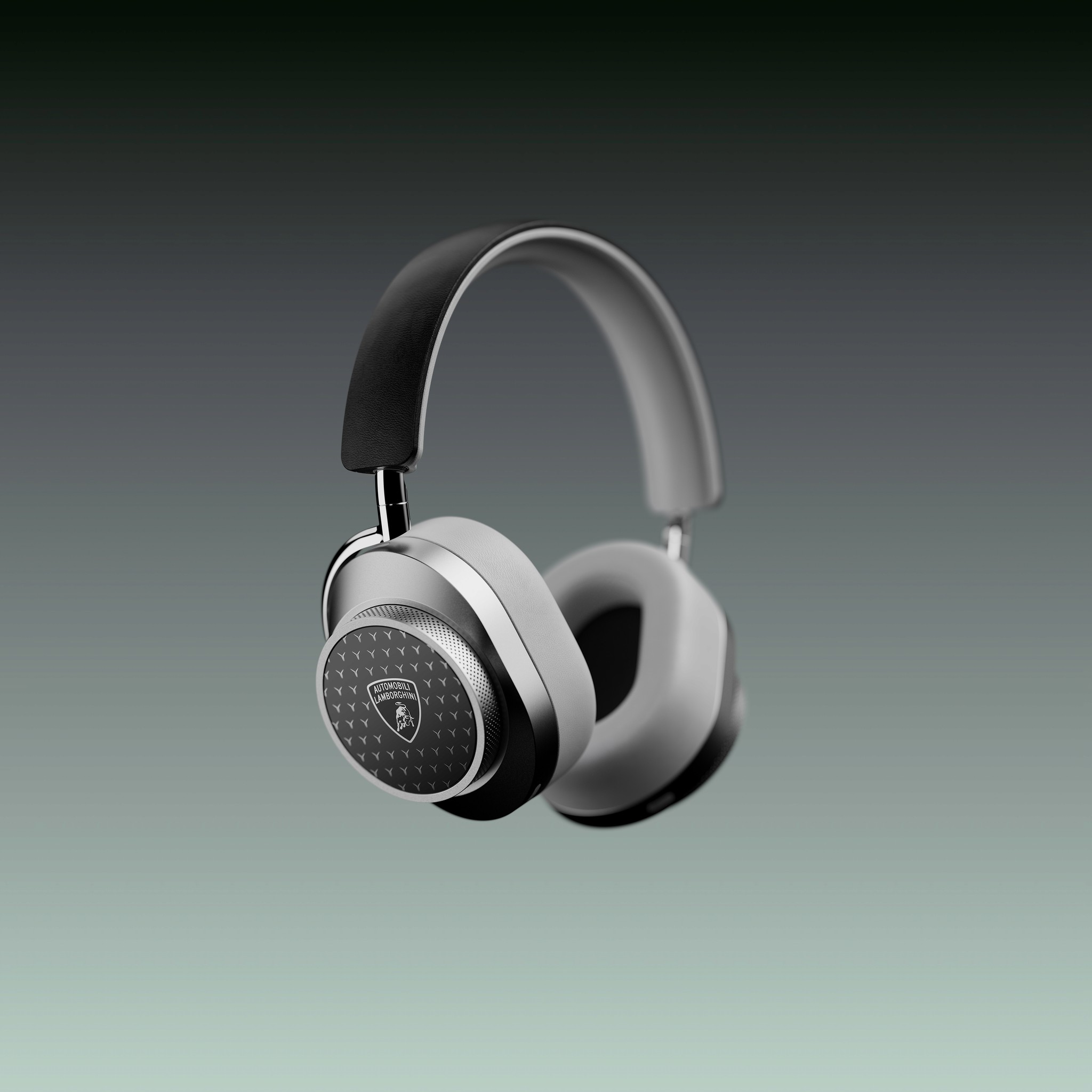 Black and white over ear headphones floating on a green gradient background