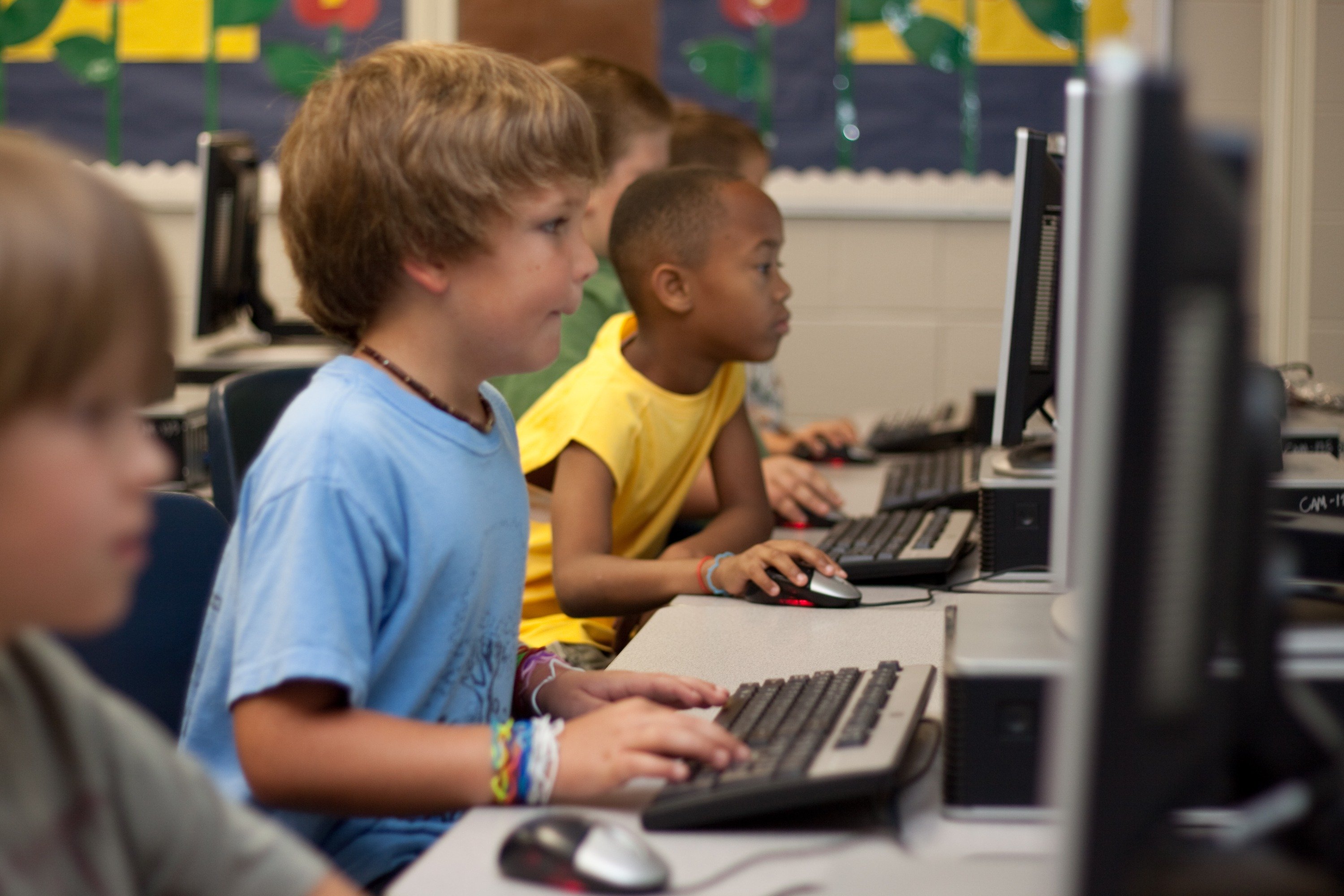 students-before-desktop-computers