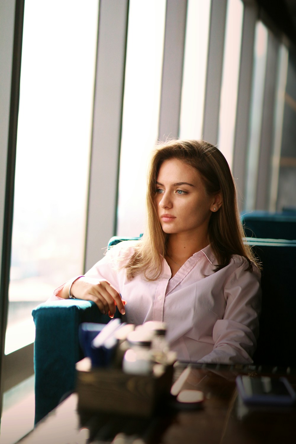 Revenue leader working by a tall office window