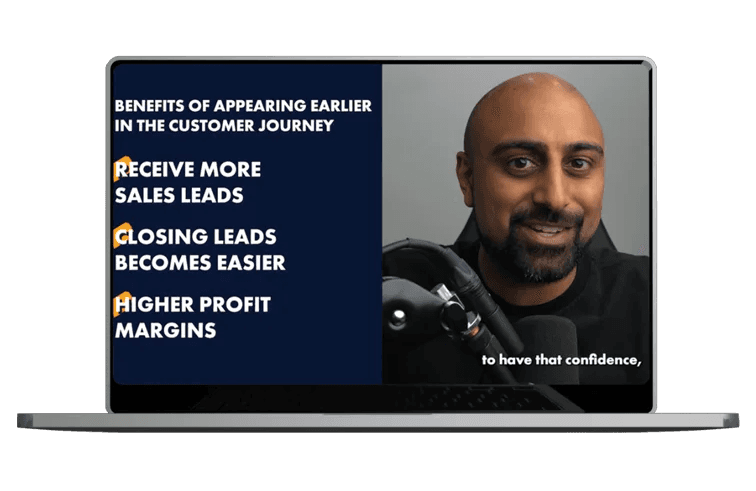 man-smiling-speaking-into-microphone-with-text-on-screen-listing-benefits-of-appearing-earlier-in-customer-journey