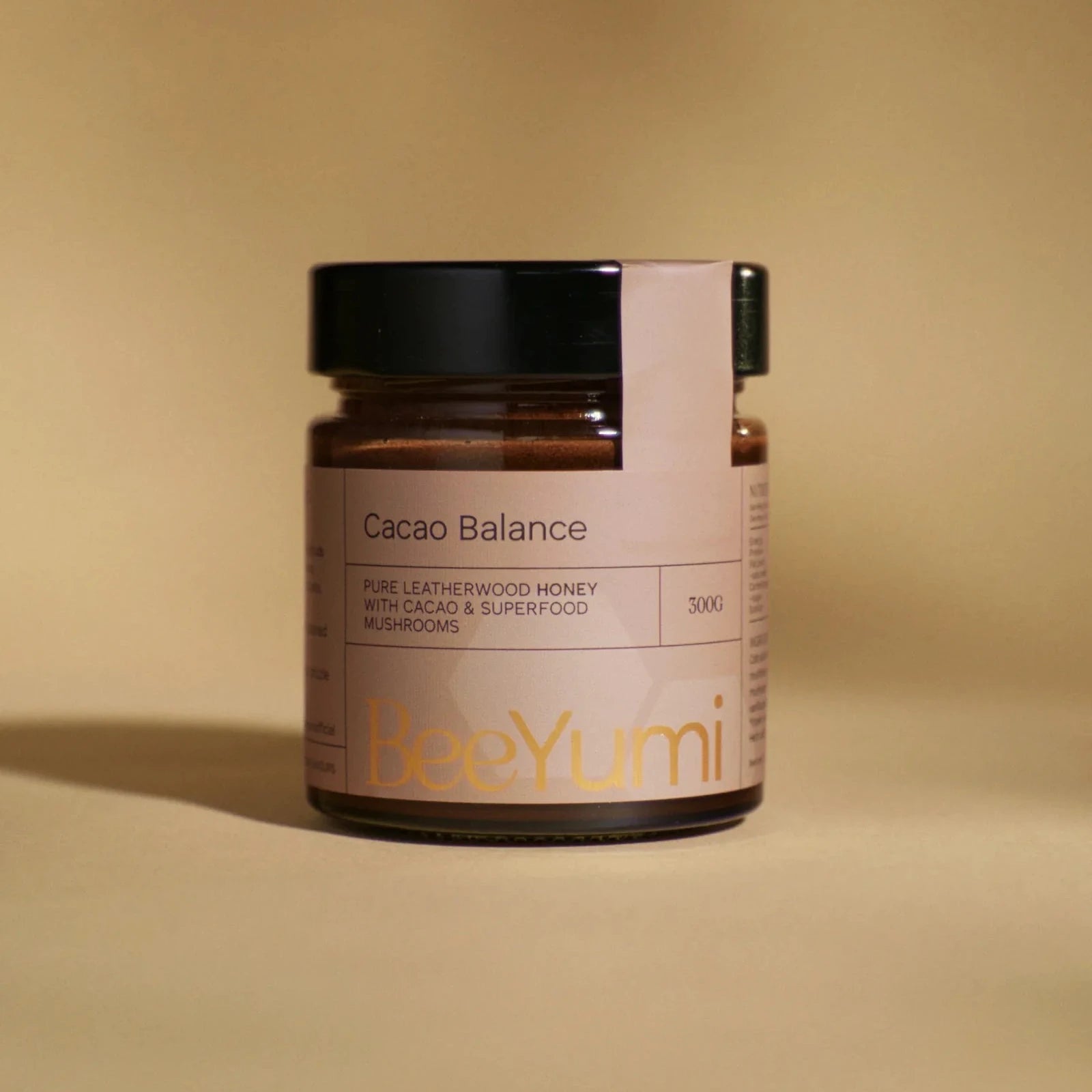 Jar of 'Cacao Balance' by BeeYumi on a beige background