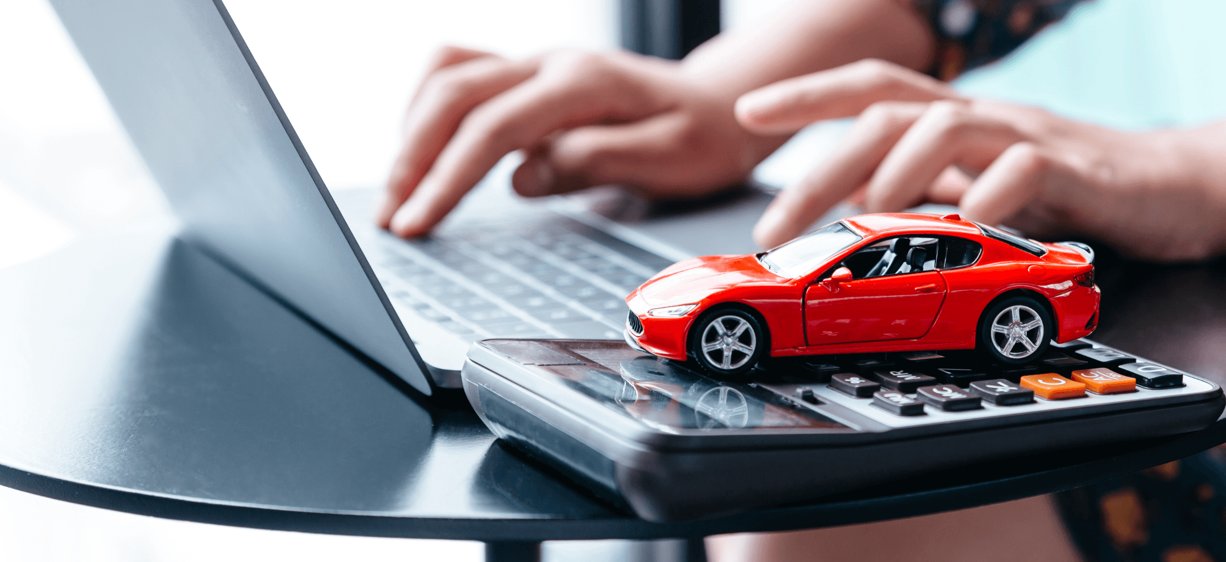 User completing Irish Motor Tax Online with laptop