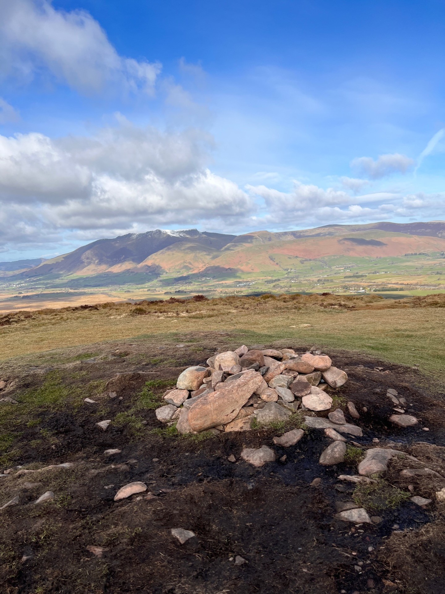 The small stone cairn at the top of Great Mell Fell.