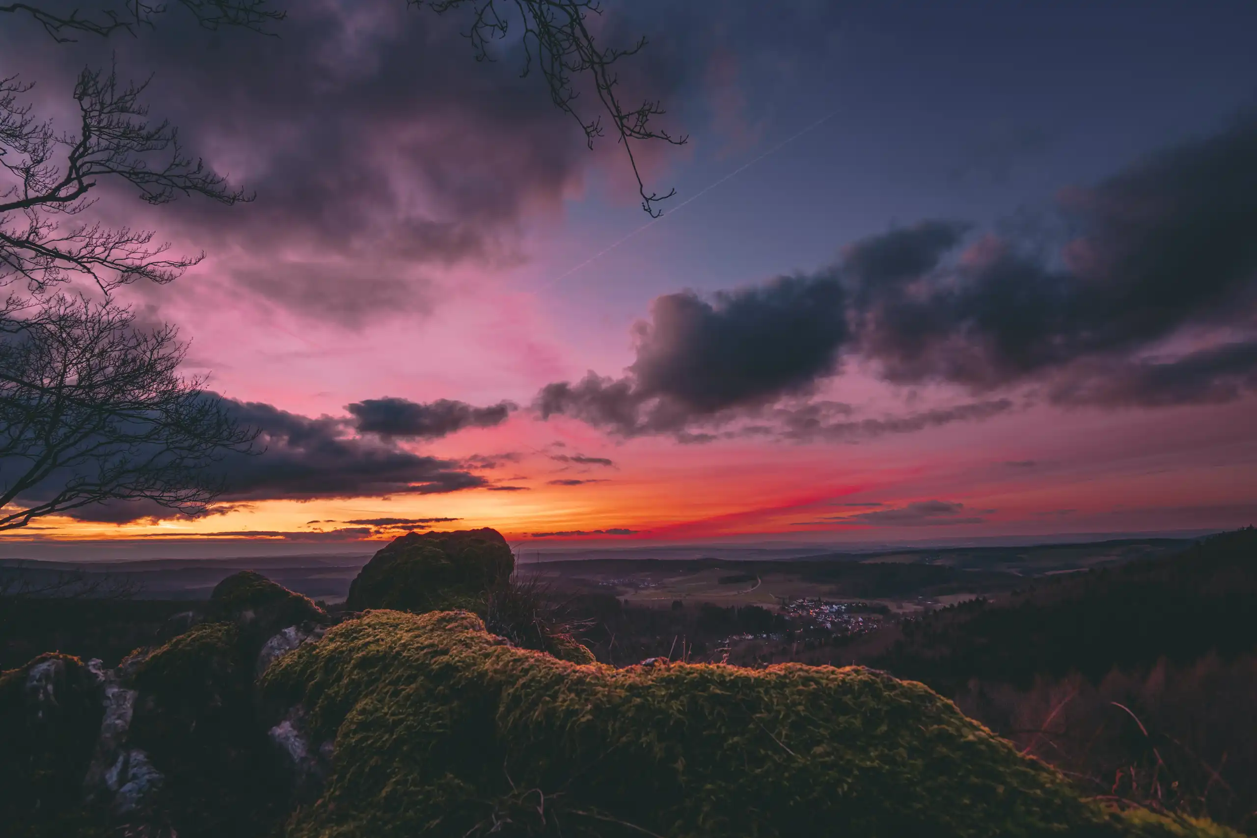 Pink and purple sunset sky over the Taunus hills