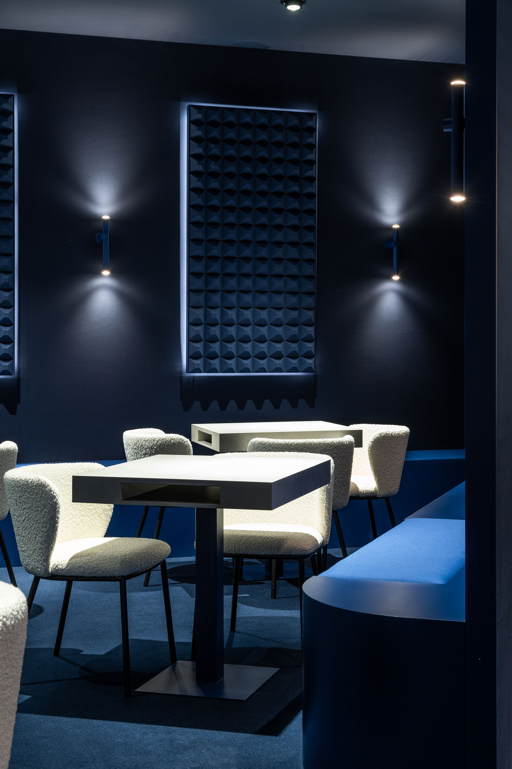 Talyor solution table and accoustic panel of the H. Moser & Cie design retail and creative  concept booth for the Watches and Wonders fair 2024 