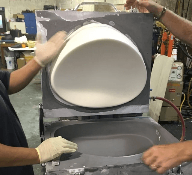UNDO meditation cushion form being removed from a production mold