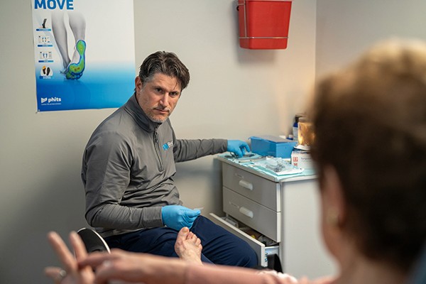 A happy doctor with patient
