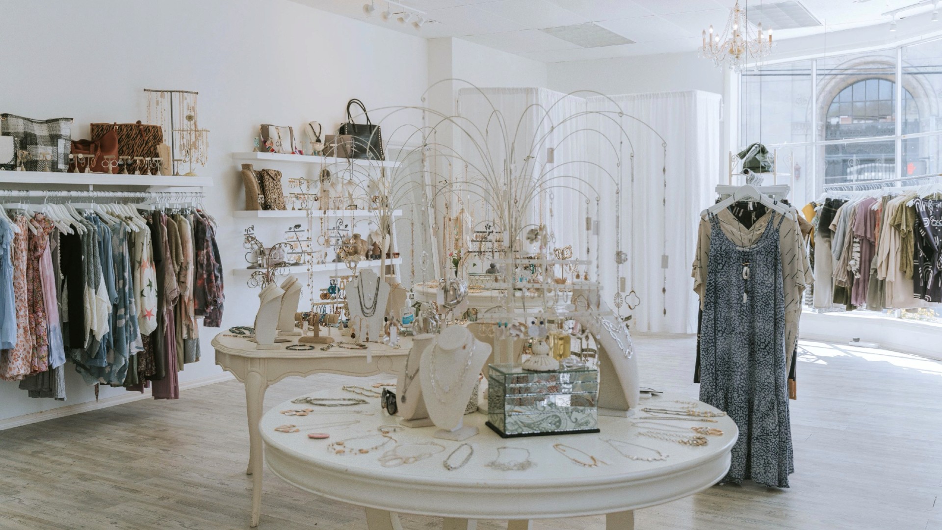 Angled stack of white business cards with lavender-coloured edges leaning against a purple wall; the top card shows a small gradient pill logo and “Circular” in the top right, plus contact details at the bottom.