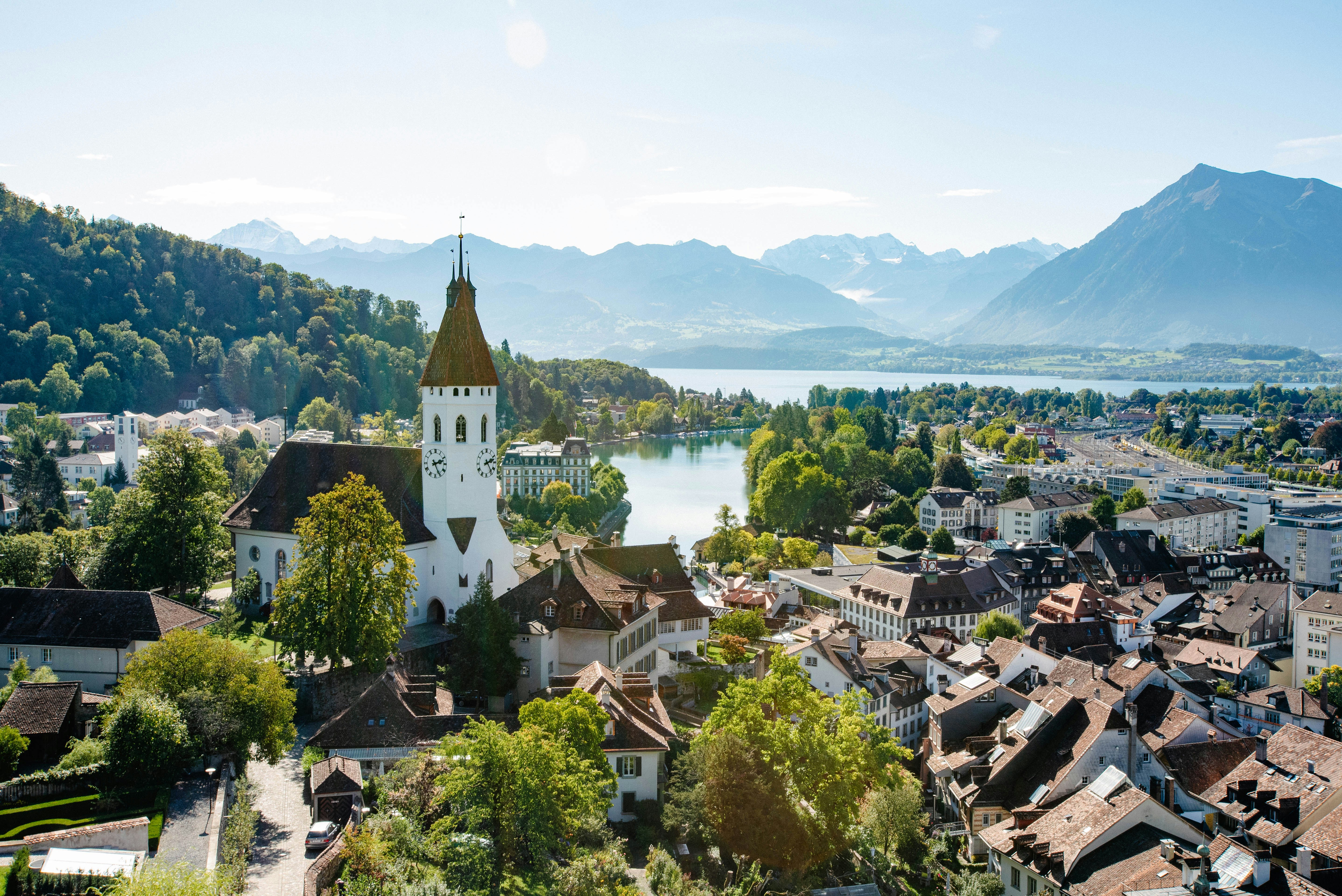 a person sitting on a couch with a laptop