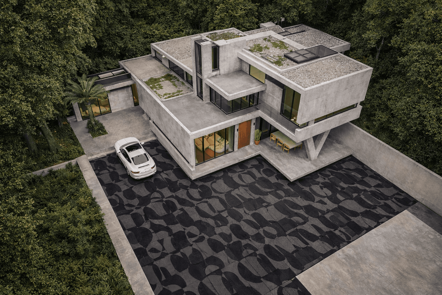 Stone paved curved driveway with landscape elements in residential outdoor space