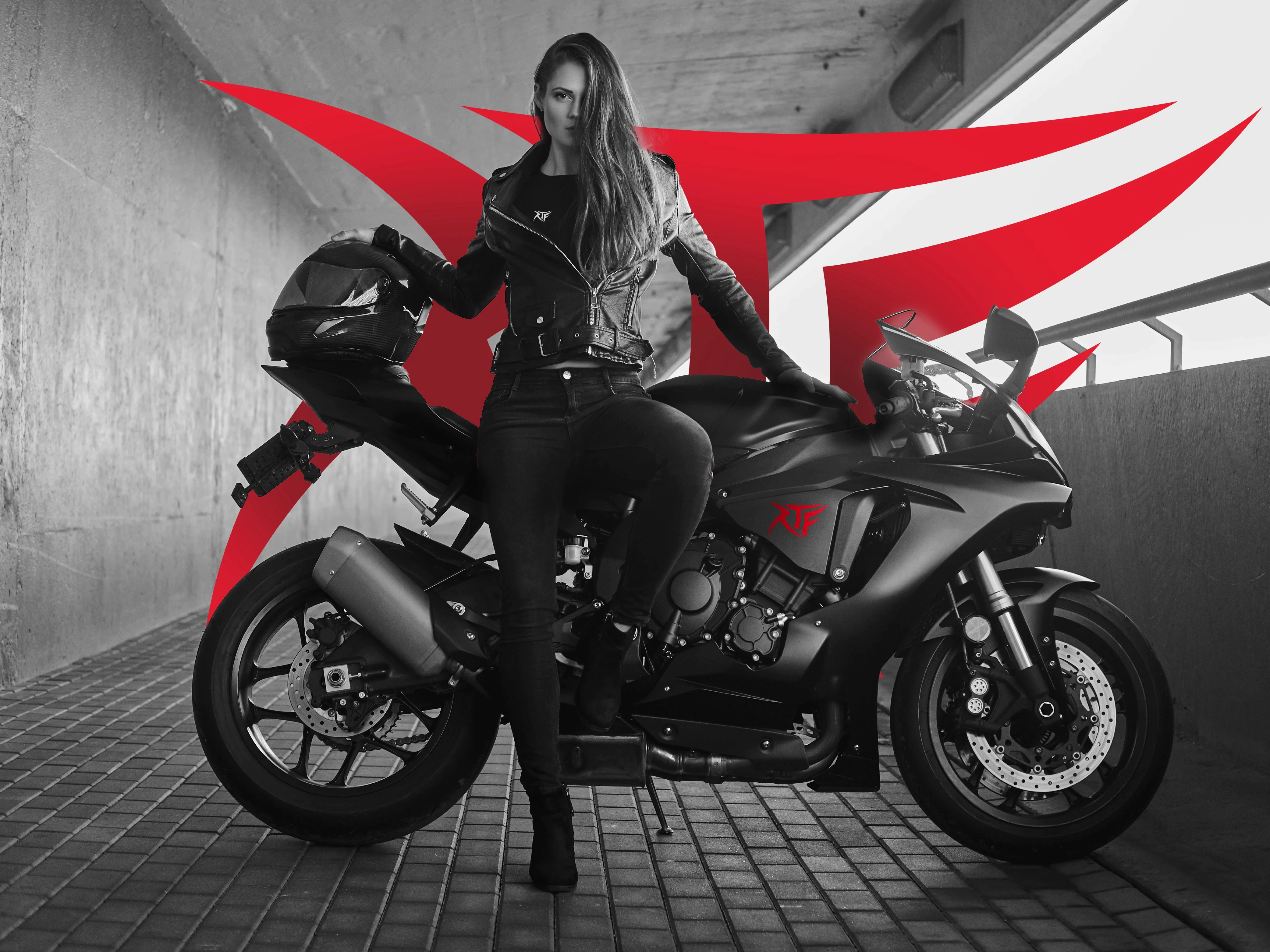 black and white image of a biker girl seating on a motorcyle and RTF big red logo in the background