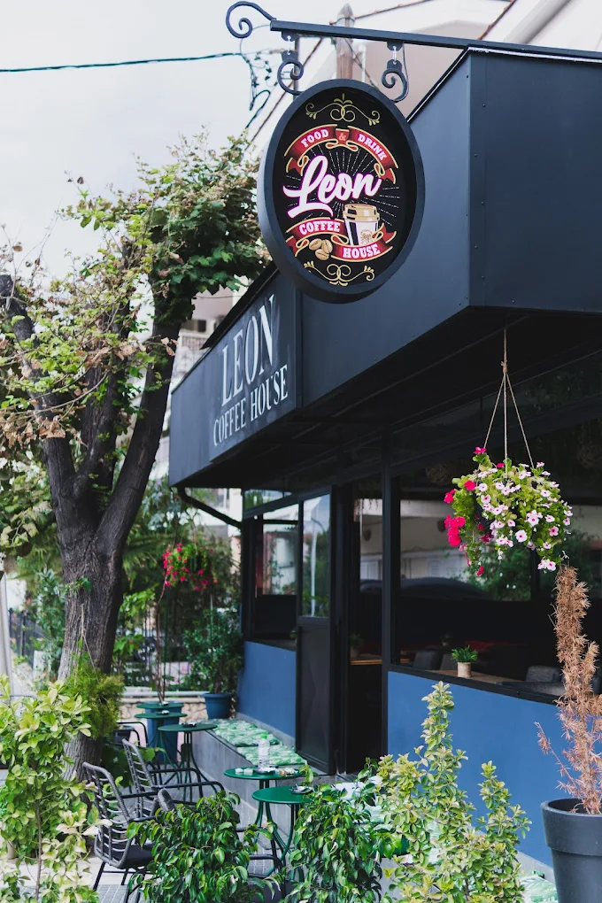 Chef carefully prepares plates for serving.