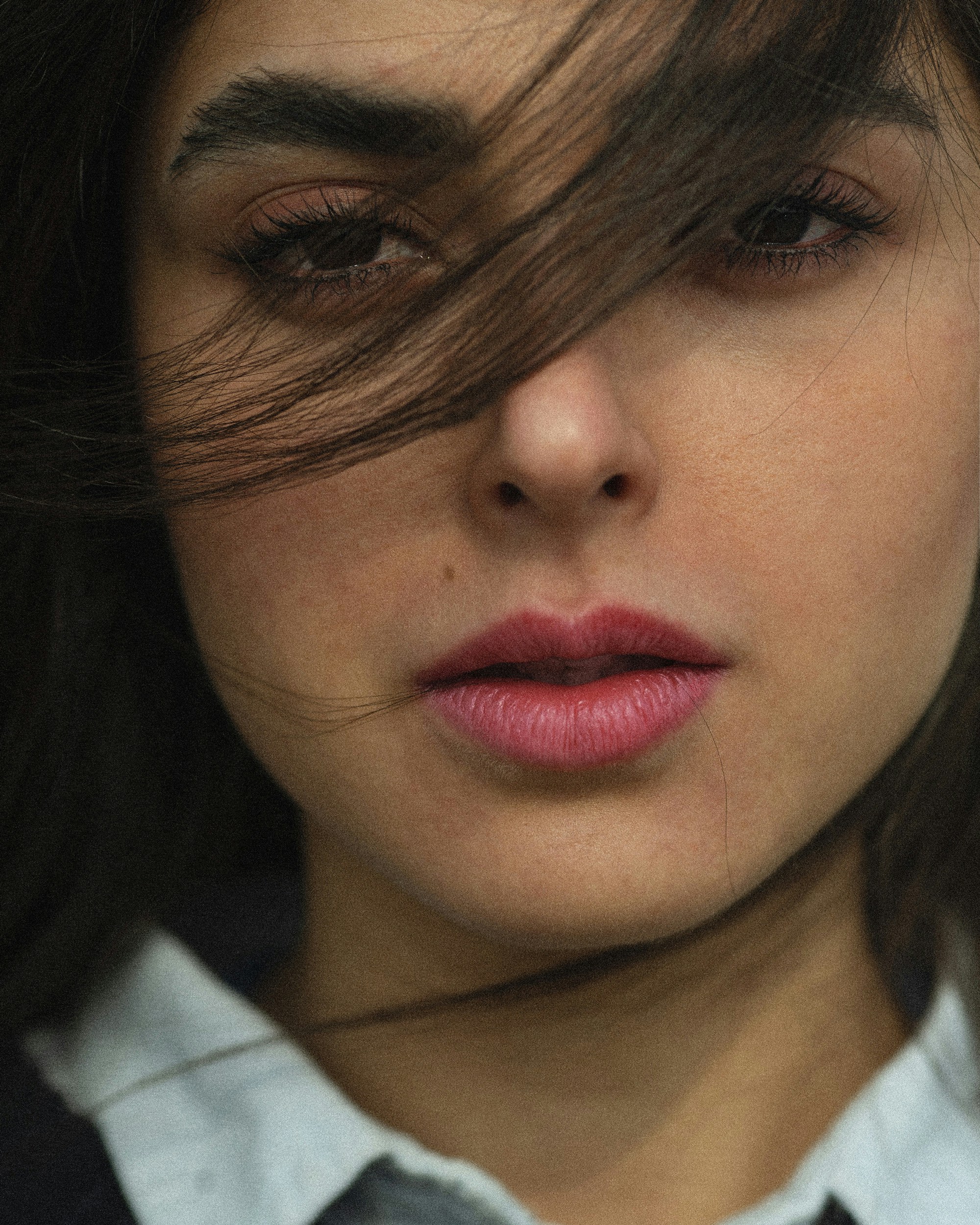 a close up of a person wearing a tie